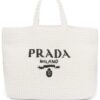 20097015_45229602_1000.jpg Prada logo-embroidered raffia tote bag
