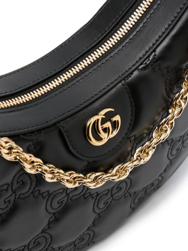 20105819_52885007_1000.jpg Gucci small GG matelassé shoulder bag