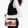20113122_45315998_1000.jpg Balmain logo-plaque shoulder bag