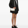20273479_52009209_1000.jpg Moschino metal-corners leather crossbody bag