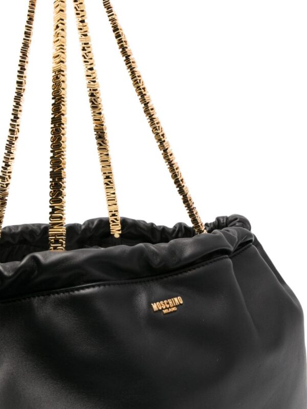20274488_52020574_1000.jpg Moschino logo-appliqué leather bucket bag