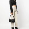 20311336_50344294_1000.jpg DKNY buckle-detailed shoulder bag