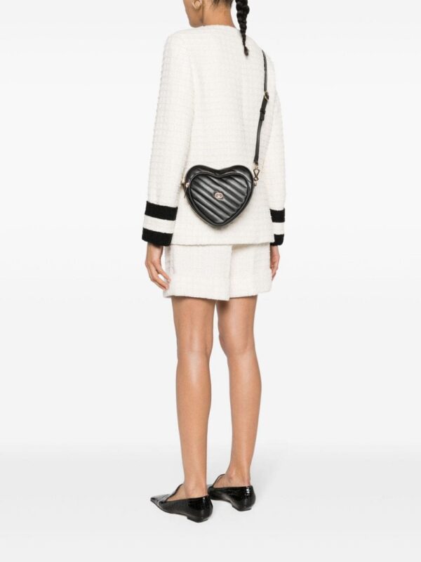 20559346_52912895_1000.jpg Gucci mini Interlocking G Heart crossbody bag