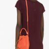 20570728_50561520_1000.jpg Tory Burch faux-shearling bucket bag