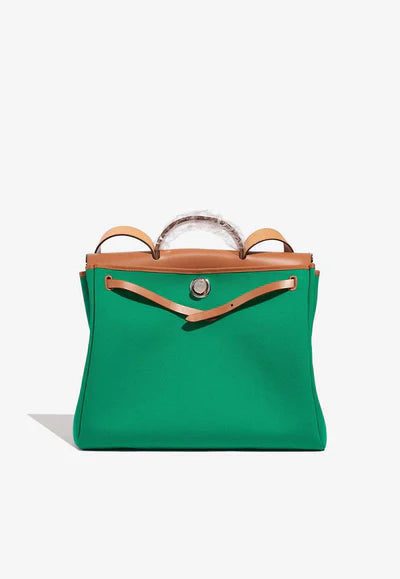 2075_Hermes_Herbag_39_GreenBlue_XL_2FO_S_400x_0bebdc5f-8893-4c50-bfb7-1143fde98e32.jpg Hermès Herbag 39 Top Handle Bag in Vert Toile and Gold Vache Hunter bag