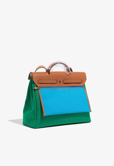2075_Hermes_Herbag_39_GreenBlue_XL_5SB_S_400x_a4c6c2b0-537b-48ed-9607-aa83cba09067.jpg Hermès Herbag 39 Top Handle Bag in Vert Toile and Gold Vache Hunter bag
