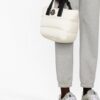 20878296_50881252_1000.jpg Moncler Caradoc padded mini tote bag