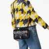 20914734_50894578_1000.jpg Gucci small GG Marmont patent-leather shoulder bag