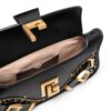 20989359_51070356_1000.jpg Balmain Blaze monogram-jacquard leather clutch bag