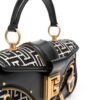 20989359_51070358_1000.jpg Balmain Blaze monogram-jacquard leather clutch bag