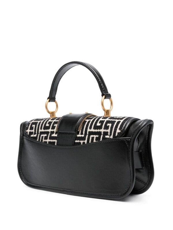 20989359_51070359_1000.jpg Balmain Blaze monogram-jacquard leather clutch bag