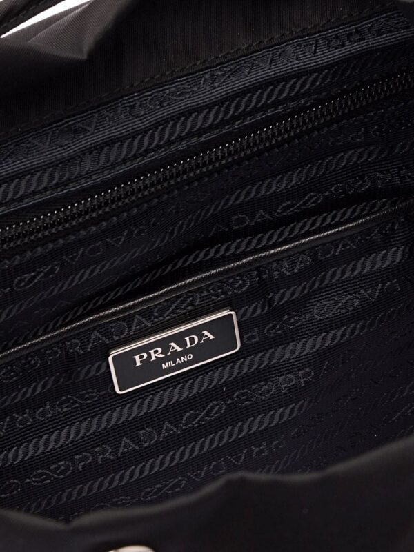 17027603_37176524_1000.jpg Prada logo-plaque backpack