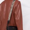 17512420_36404464_1000.jpg Emporio Armani logo-print strap crossbody bag