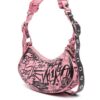 18942542_53758374_1000.jpg Balenciaga Le Cagole XS graffiti shoulder bag