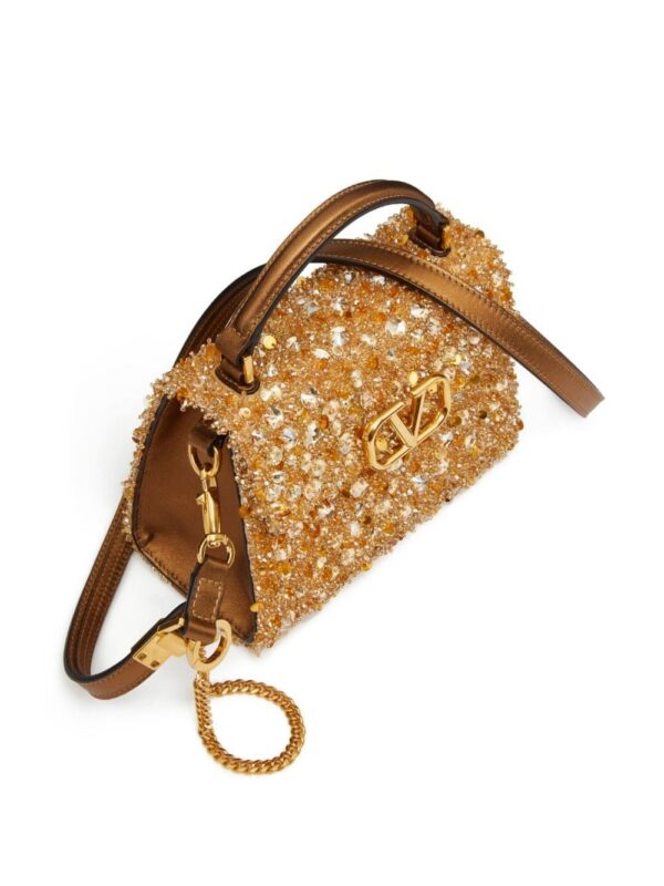 19182270_50326083_1000.jpg Valentino Garavani mini VSLING embellished handbag