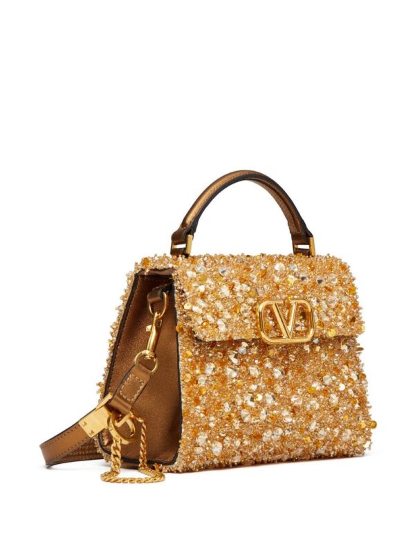 19182270_50326091_1000.jpg Valentino Garavani mini VSLING embellished handbag