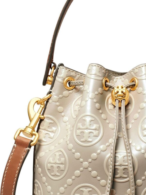 19447949_43785160_1000.jpg Tory Burch monogram-embossed bucket bag