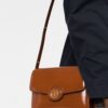 19506405_43528316_1000.jpg Tory Burch logo-plaque crossbody bag