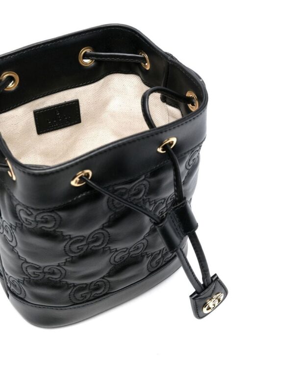 19555647_52880863_1000.jpg Gucci GG matelassé bucket bag
