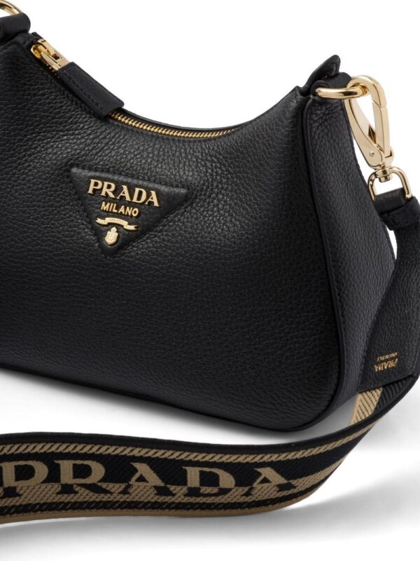 19559134_43659534_1000.jpg Prada logo-strap cross body bag