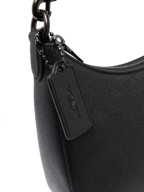 20203655_50365287_1000.jpg Coach logo-strap shoulder bag