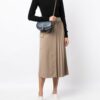 20913828_51402266_1000.jpg Michael Kors small Mila logo-plaque crossbody bag