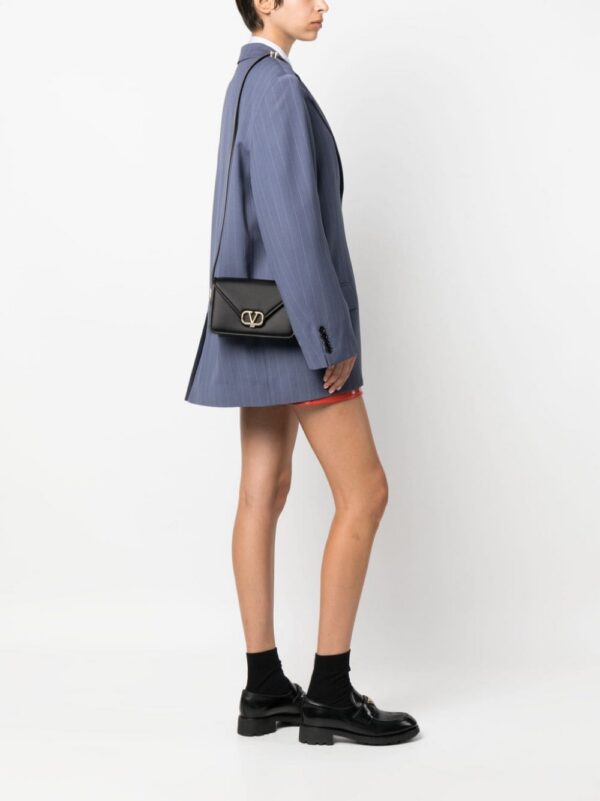 20989365_51107196_1000.jpg Valentino Garavani small Letter leather shoulder bag