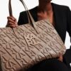 21540185_53449497_1000.jpg Karl Lagerfeld logo-embossed leather tote bag