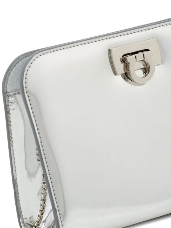 21832390_52055251_1000.jpg Ferragamo mini Diana metallic-finish clutch