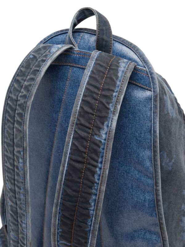 21896572_52778131_1000.jpg Diesel Rave coated denim backpack