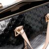 22094468_51921232_1000.jpg Michael Michael Kors Grayson monogram-embossed duffel bag