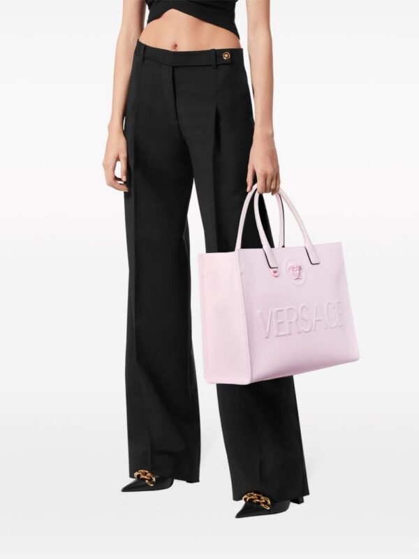 22100437_52464932_1000.jpg Versace La Medusa leather tote bag