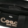 22125089_52007200_1000.jpg Coach logo-embroidered canvas tote bag