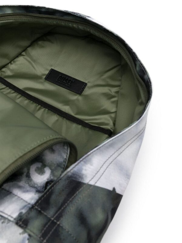 22213727_52185069_1000_47682d23-4c1e-4691-8137-dee310bc37c5.jpg Diesel Rave X camouflage-print backpack