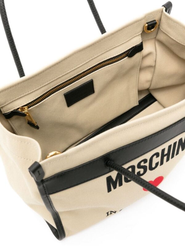 22301441_52561850_1000.jpg Moschino logo-embroidered canvas tote bag