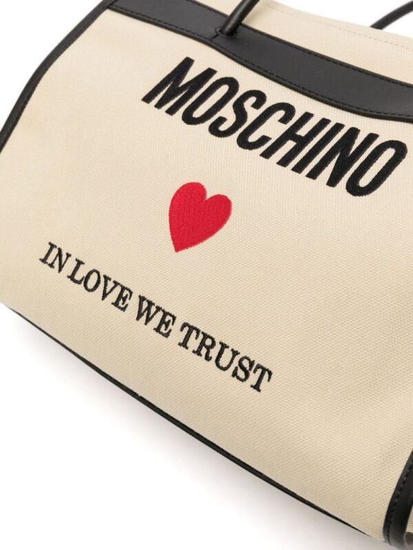 22301441_52561852_1000.jpg Moschino logo-embroidered canvas tote bag