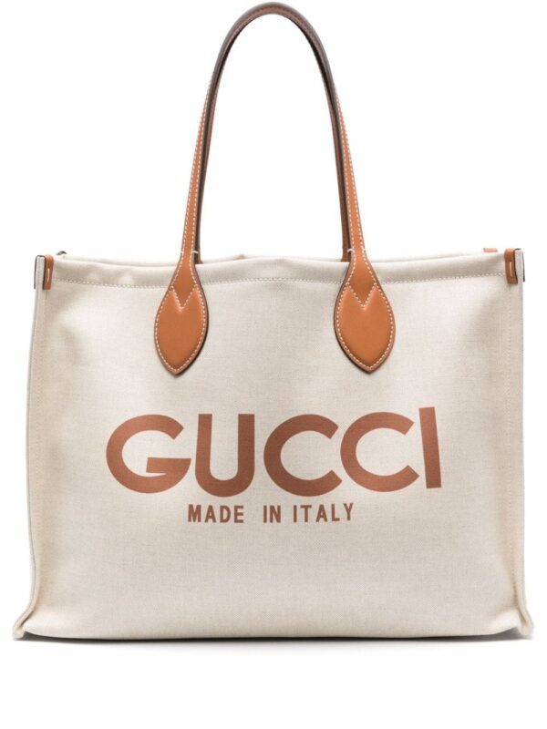 22695722_53366530_1000.jpg Gucci logo-print canvas tote bag