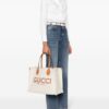 22695722_53366559_1000.jpg Gucci logo-print canvas tote bag