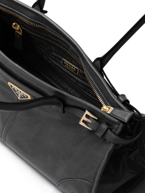 22729066_52708842_1000.jpg Prada enamel triangle-logo leather tote bag