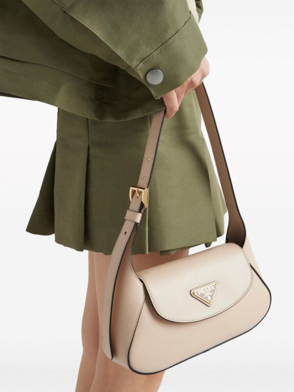 22729070_52709197_1000.jpg Prada small logo-plaque shoulder bag