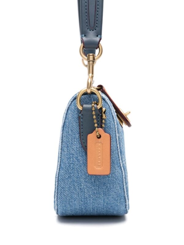 23131642_53271653_1000.jpg Coach Swinger 20 denim shoulder bag
