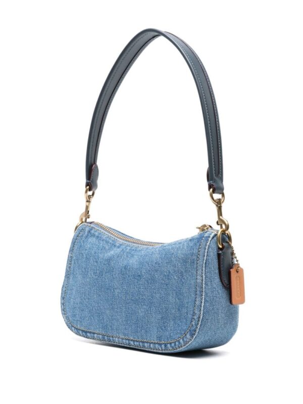 23131642_53271656_1000.jpg Coach Swinger 20 denim shoulder bag