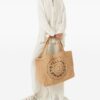23376395_53857706_1000.jpg Stella McCartney embroidered-logo raffia tote bag
