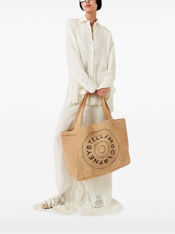 23376395_53857706_1000.jpg Stella McCartney embroidered-logo raffia tote bag