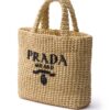 23820181_53822575_1000.jpg Prada logo-embroidered straw tote bag