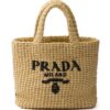23820181_53822576_1000.jpg Prada logo-embroidered straw tote bag