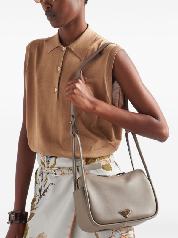 23897386_53955998_1000.jpg Prada logo-plaque leather tote bag