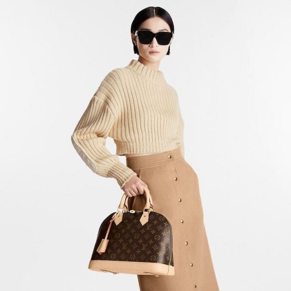 louis-vuitton-alma-pm-monogram-handbags-M53151_PM1_Croppedwornview.jpg Louis Vuitton Nano Alma