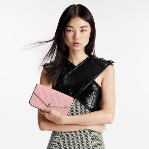 louis-vuitton-felicie-pochette-monogram-empreinte-wallets-and-small-leather-goods-M82608_PM1_Croppedwornview.jpg Louis Vuitton Félicie Pochette