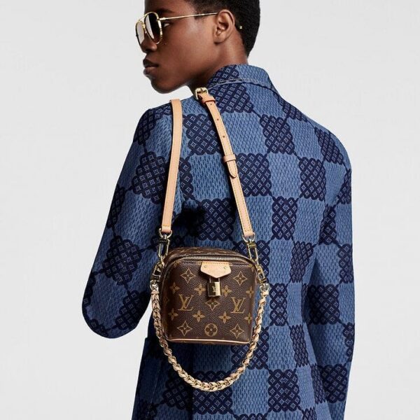 louis-vuitton-just-in-case-monogram-handbags-M47096_PM1_Croppedwornview.jpg Louis Vuitton Just In Case